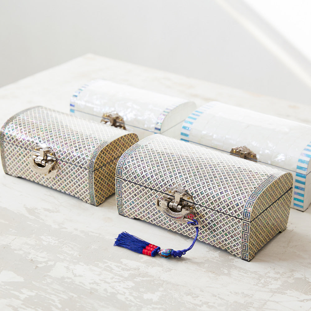 Seven Treasures and White Pearl jewelry boxes shown together for design and size comparison