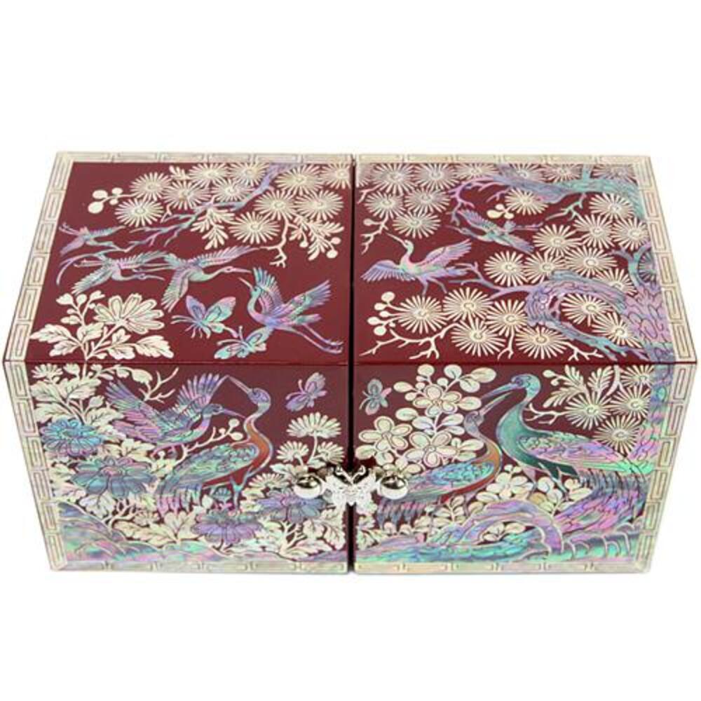 Deep red lacquer Korean double-lidded jewelry box, cranes beneath pine boughs with blossoms and butterflies inlaid in mother-of-pearl across both lids, butterfly clasp at the centre