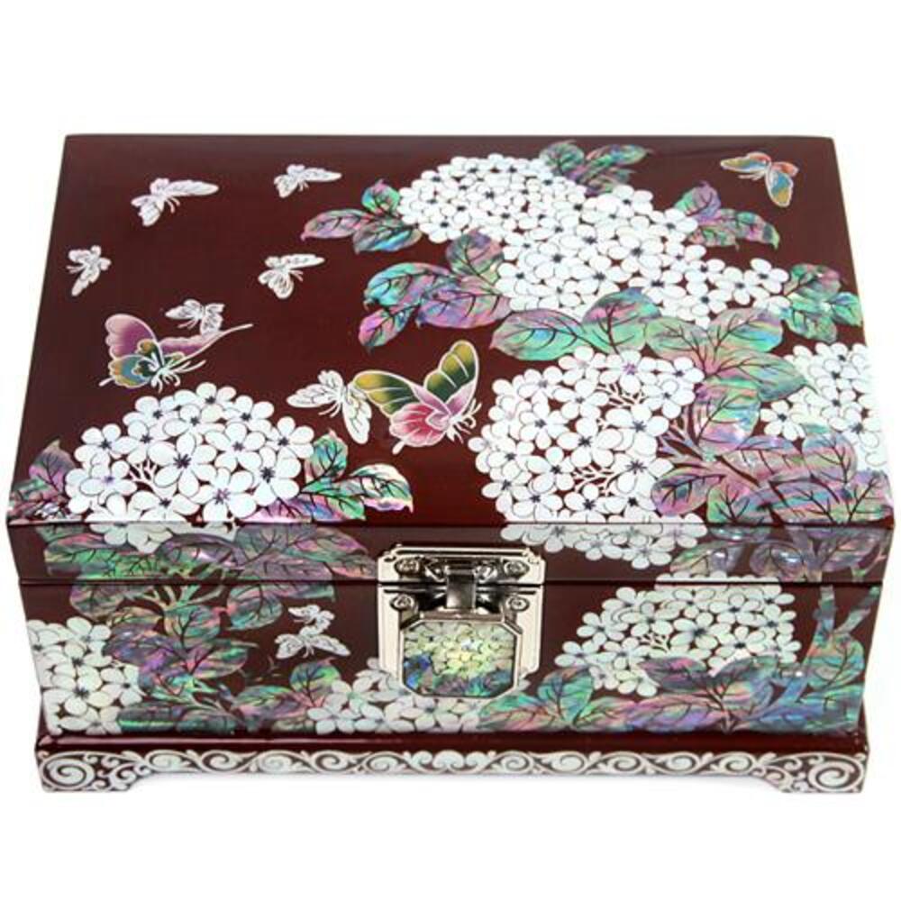 Deep red lacquer Korean jewelry box with white shell hydrangea blooms, green and violet leaves and fluttering butterflies inlaid in mother-of-pearl across the lid and front