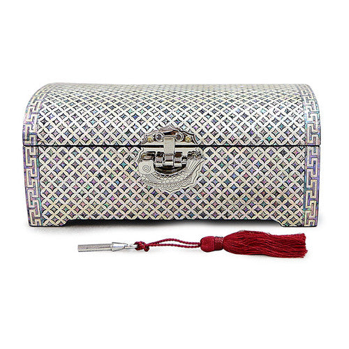 Front clasp and tassel on the Seven Treasures mother-of-pearl jewelry box