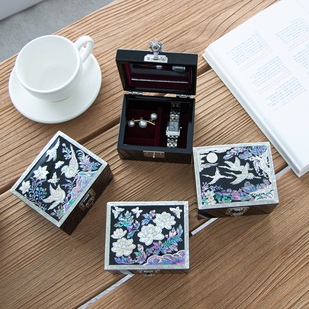 Joseon-style mother-of-pearl jewelry box, lid inlaid with peonies, blossoms and butterflies inside a fine nacre border